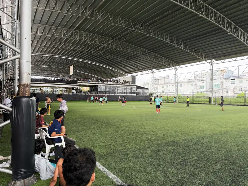 Watching from the bench under the roof